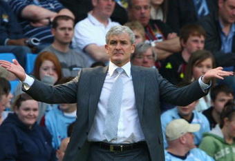MANCHESTER, UNITED KINGDOM - APRIL 19:  Manchester City Manager Mark Hughes gestures during the Barclays Premier League match between Manchester City and West Bromwich Albion at the City of Manchester Stadium on April 19, 2009 in Manchester, England. (Photo by Clive Brunskill/Getty Images)