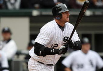 CHICAGO - APRIL 29:  A.J. Pierzynski #12 of the Chicago White Sox bats against the Seattle Mariners during the game on April 29, 2009 at U.S. Cellular Field in Chicago, Illinois. (Photo by Jonathan Daniel/Getty Images) 