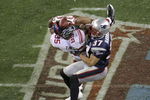 GLENDALE, AZ - FEBRUARY 03:  David Tyree #85 of the New York Giants catches a 32-yard pass from Eli Manning #10 as Rodney Harrison #37 of the New England Patriots attempts to knock it out in the fourth quarter of Super Bowl XLII on February 3, 2008 at the University of Phoenix Stadium in Glendale, Arizona. The Giants defeated the Patriots 17-14.  (Photo by Doug Pensinger/Getty Images)