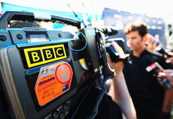 MELBOURNE, AUSTRALIA - MARCH 26:  Mark Webber of Australia and Red Bull Racing is interviewed by the BBC in the paddock during previews to the Australian Formula One Grand Prix at the Albert Park Circuit on March 26, 2009 in Melbourne, Australia.  (Photo by Clive Mason/Getty Images)