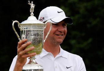 FARMINGDALE, NY - JUNE 22:  Lucas Glover celebrates with the winner's trophy after his two-stroke victory at the 109th U.S. Open on the Black Course at Bethpage State Park on June 22, 2009 in Farmingdale, New York.  (Photo by Sam Greenwood/Getty Images)