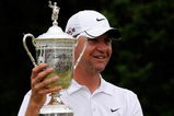 FARMINGDALE, NY - JUNE 22:  Lucas Glover celebrates with the winner's trophy after his two-stroke victory at the 109th U.S. Open on the Black Course at Bethpage State Park on June 22, 2009 in Farmingdale, New York.  (Photo by Sam Greenwood/Getty Images)