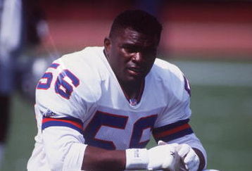 4 SEP 1992:  NEW YORK GIANTS LINEBACKER LAWRENCE TAYLOR RELAXES BEFORE THEIR 13-10 WIN OVER THE LOS ANGELES RAIDERS AT THE LOS ANGELESCOLISEUM IN LOS ANGELES, CALIFORNIA. Mandatory Credit: Ken Levine/ALLSPORT