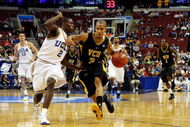 PHILADELPHIA - MARCH 19: Eric Maynor #3 of the VCU Rams drives against Darren Collison #2 of the UCLA Bruins during the first round of the NCAA Division I Men's Basketball Tournament at the Wachovia Center on March 19, 2009 in Philadelphia, Pennsylvania. (Photo by Jim McIsaac/Getty Images)