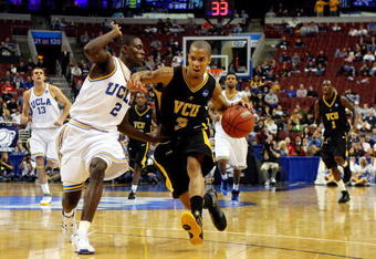 PHILADELPHIA - MARCH 19:  Eric Maynor #3 of the VCU Rams drives against Darren Collison #2 of the UCLA Bruins during the first round of the NCAA Division I Men's Basketball Tournament at the Wachovia Center on March 19, 2009 in Philadelphia, Pennsylvania.  (Photo by Jim McIsaac/Getty Images)