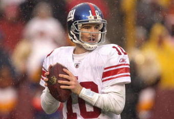 LANDOVER, MD - NOVEMBER 30:  Quarterback Eli Manning #10 of the New York Giants drops back to pass the ball against the Washington Redskins during their game at FedEx Field on November 30, 2008 in Landover, Maryland. (Photo by Streeter Lecka/Getty Images)