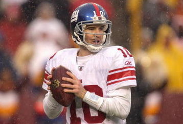 LANDOVER, MD - NOVEMBER 30:  Quarterback Eli Manning #10 of the New York Giants drops back to pass the ball against the Washington Redskins during their game at FedEx Field on November 30, 2008 in Landover, Maryland. (Photo by Streeter Lecka/Getty Images)