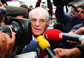 NORTHAMPTON, UNITED KINGDOM - JUNE 19:  F1 supremo Bernie Ecclestone is beseiged by the media in the paddock during practice for the British Formula One Grand Prix at Silverstone on June 19, 2009 in Northampton, England.  (Photo by Clive Mason/Getty Images)