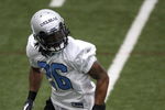 ALLEN PARK, MI - MAY 01:  Louis Delmas #26 of the Detroit Lions looks for a pass during rookie orientation camp at the Detroit Lions Headquarters and Training Facility on May 1, 2009 in Allen Park, Michigan.  (Photo by Gregory Shamus/Getty Images)
