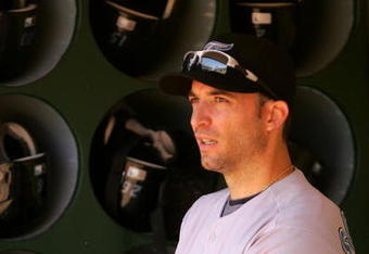 OAKLAND, CA - MAY 09:  Marco Scutaro #19 of the Toronto Blue Jays stands in the dugout before their game against the Oakland Athletics on May 9, 2009 at the Oakland Coliseum in Oakland, California.  (Photo by Ezra Shaw/Getty Images)