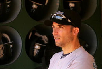 OAKLAND, CA - MAY 09:  Marco Scutaro #19 of the Toronto Blue Jays stands in the dugout before their game against the Oakland Athletics on May 9, 2009 at the Oakland Coliseum in Oakland, California.  (Photo by Ezra Shaw/Getty Images)