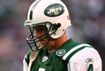 EAST RUTHERFORD, NJ - DECEMBER 14:  Brett Favre #4 of The New York Jets walks on the field against The Buffalo Bills during their game on December 14, 2008 at Giants Stadium in East Rutherford, New Jersey.  (Photo by Al Bello/Getty Images)