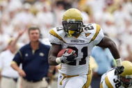 CHESTNUT HILL, MA - SEPTEMBER 6:  Running back Jonathan Dwyer #21 of the Georgia Tech Yellow Jackets runs with the ball during their game against the Boston College Eagles on September 6, 2008 at Alumni Stadium in Chestnut Hill, Massachusetts. The Yellow Jackets defeated the Eagles 19-16. (Photo by Elsa Garrison/Getty Images)