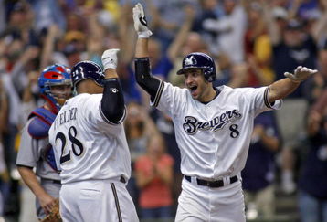 MILWAUKEE - SEPTEMBER 28:  Ryan Braun #8 of the of the Milwaukee Brewers celebrates his game winning two run home run against the Chicago Cubs with teammate Prince Fielder #28 in the eighth inning at Miller Park on September 28, 2008 in Milwaukee, Wisconsin. The Brewers defeated the Cubs 3-1 (Photo by Darren Hauck/Getty Images)