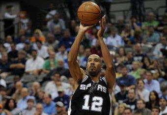 DALLAS - APRIL 25:  Guard Bruce Bowen #12 of the San Antonio Spurs during play against the Dallas Mavericks in Game Four of the Western Conference Quarterfinals during the 2009 NBA Playoffs at American Airlines Center on April 25, 2009 in Dallas, Texas. NOTE TO USER: User expressly acknowledges and agrees that, by downloading and or using this photograph, User is consenting to the terms and conditions of the Getty Images License Agreement.  (Photo by Ronald Martinez/Getty Images)