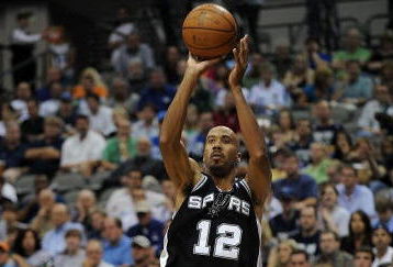 DALLAS - APRIL 25:  Guard Bruce Bowen #12 of the San Antonio Spurs during play against the Dallas Mavericks in Game Four of the Western Conference Quarterfinals during the 2009 NBA Playoffs at American Airlines Center on April 25, 2009 in Dallas, Texas. NOTE TO USER: User expressly acknowledges and agrees that, by downloading and or using this photograph, User is consenting to the terms and conditions of the Getty Images License Agreement.  (Photo by Ronald Martinez/Getty Images)