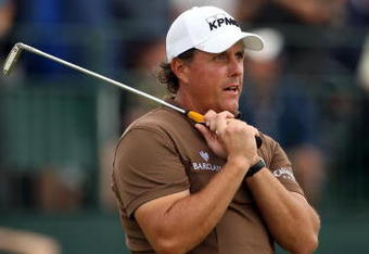 FARMINGDALE, NY - JUNE 22:  Phil Mickelson reacts to a missed putt on the 18th green during the continuation of the final round of the 109th U.S. Open on the Black Course at Bethpage State Park on June 22, 2009 in Farmingdale, New York.  (Photo by Andrew Redington/Getty Images)
