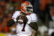 PASADENA, CA - JANUARY 01:  Quarterback Juice Williams #7 of the Illinois Fighting Illini drops back to pass against the USC Trojans during the Rose Bowl presented by Citi at the Rose Bowl on January 1, 2008 in Pasadena, California.  The Trojans defeated the Fighting Illini 49-17.  (Photo by Christian Petersen/Getty Images)