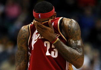 MILWAUKEE - FEBRUARY 20: LeBron James #23 of the Cleveland Cavaliers wipes sweat off of his face near the end of a game against the Milwaukee Bucks in which he scored a game-high 55 points on February 20, 2009 at the Bradley Center in Milwaukee, Wisconsin. The Cavaliers defeated the Bucks 111-103. NOTE TO USER: User expressly acknowledges and agreees that, by downloading and/or using this Photograph, User is consenting to the terms and conditions of the Getty Images License Agreement.  (Photo by Jonathan Daniel/Getty Images)