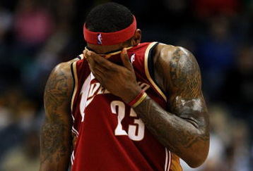 MILWAUKEE - FEBRUARY 20: LeBron James #23 of the Cleveland Cavaliers wipes sweat off of his face near the end of a game against the Milwaukee Bucks in which he scored a game-high 55 points on February 20, 2009 at the Bradley Center in Milwaukee, Wisconsin. The Cavaliers defeated the Bucks 111-103. NOTE TO USER: User expressly acknowledges and agreees that, by downloading and/or using this Photograph, User is consenting to the terms and conditions of the Getty Images License Agreement.  (Photo by Jonathan Daniel/Getty Images)