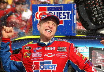 BROOKLYN, MI - JUNE 14:  Mark Martin, driver of the #5 CARQUEST/Kellogg's Chevrolet, celebrates in victory lane after winning the NASCAR Sprint Cup Series LifeLock 400 at Michigan International Speedway on June 14, 2009 in Brooklyn, Michigan.  (Photo by Ezra Shaw/Getty Images)