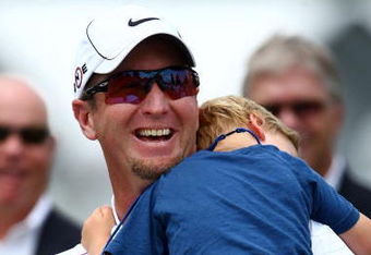 FARMINGDALE, NY - JUNE 22:  David Duval smiles while holding his two year old son Brayden during the trophy presentation after the final round of the 109th U.S. Open on the Black Course at Bethpage State Park on June 22, 2009 in Farmingdale, New York.  (Photo by Chris McGrath/Getty Images)