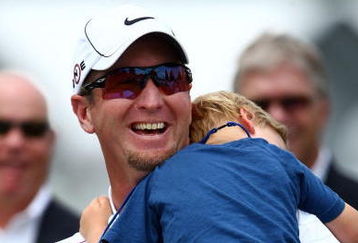 FARMINGDALE, NY - JUNE 22:  David Duval smiles while holding his two year old son Brayden during the trophy presentation after the final round of the 109th U.S. Open on the Black Course at Bethpage State Park on June 22, 2009 in Farmingdale, New York.  (Photo by Chris McGrath/Getty Images)