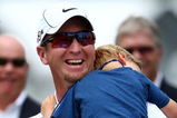 FARMINGDALE, NY - JUNE 22:  David Duval smiles while holding his two year old son Brayden during the trophy presentation after the final round of the 109th U.S. Open on the Black Course at Bethpage State Park on June 22, 2009 in Farmingdale, New York.  (Photo by Chris McGrath/Getty Images)