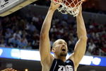 MEMPHIS, TN - MARCH 27:  Josh Heytvelt #42 of the Gonzaga Bulldogs dunks the ball over Deon Thompson #21 of the North Carolina Tar Heels in the first half during the NCAA Men's Basketball Tournament South Regionals at the FedExForum on March 27, 2009 in Memphis, Tennessee.  (Photo by Joe Murphy/Getty Images)