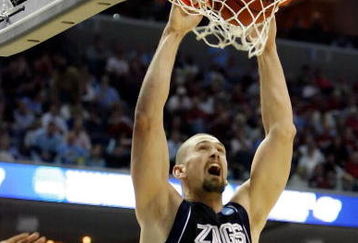 MEMPHIS, TN - MARCH 27:  Josh Heytvelt #42 of the Gonzaga Bulldogs dunks the ball over Deon Thompson #21 of the North Carolina Tar Heels in the first half during the NCAA Men's Basketball Tournament South Regionals at the FedExForum on March 27, 2009 in Memphis, Tennessee.  (Photo by Joe Murphy/Getty Images)