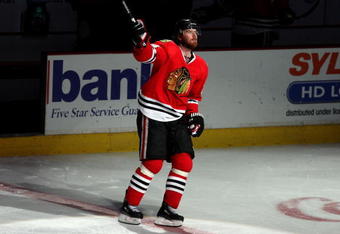 CHICAGO - MAY 07:  Martin Havlat #24 of the Chicago Blackhawks skates on the ice after he was named number 2 star of the game against the Vancouver Canucks during Game Four of the Western Conference Semifinal Round of the 2009 Stanley Cup Playoffs on May 7, 2009 at the United Center in Chicago, Illinois. The Blackhawks won 2-1. (Photo by Jonathan Daniel/Getty Images)