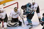 SAN JOSE, CA - APRIL 25:  Patrick Marleau #12 of the San Jose Sharks looks for the rebound just before scoring the game winning goal against goaltender Jonas Hiller #1 and Chris Pronger #25 of the Anaheim Ducks during Game Five of the Western Conference Quarterfinal Round of the 2009 NHL Stanley Cup Playoffs at HP Pavilion on April 25, 2009 in San Jose, California. The Sharks won 3-2 in overtime.  (Photo by Stephen Dunn/Getty Images)