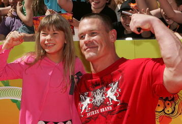 MELBOURNE, AUSTRALIA - OCTOBER 11:  WWE champion wrestler and awards co-host John Cena and TV personality and wildlife crusader Bindi Irwin arrive at the Nickelodeon Australian Kids' Choice Awards 2008 at the Hisense Arena on October 11, 2008 in Melbourne, Australia. This year's event, now in its sixth year, was held in Melbourne for the first time in its history.  (Photo by Lucas Dawson/Getty Images)