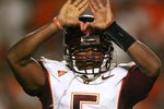 MIAMI - NOVEMBER 13:  Quarterback Tyrod Taylor #5 of the Virginia Tech Hokies celebrates after his touchdown run in the second quarter against the Miami Hurricanes at Dolphin Stadium on November 13, 2008 in Miami, Florida.  (Photo by Doug Benc/Getty Images)