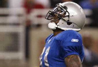 DETROIT , MI - NOVEMBER 27:  Calvin Johnson #81 of the Detroit Lions reacts after dropping a first quarter pass while playing the Tennessee Titans on November 27, 2008 at Ford Field in Detroit, Michigan.  (Photo by Gregory Shamus/Getty Images)