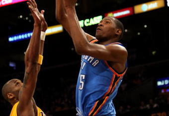 LOS ANGELES, CA - FEBRUARY 10:  Kevin Durant #35 of the Oklahoma City Thunder shoots over Kobe Bryant #24 of the Los Angeles Lakers on February 10, 2009 at Staples Center in Los Angeles, California.  The Lakers won 105-98.   NOTE TO USER: User expressly acknowledges and agrees that, by downloading and/or using this Photograph, user is consenting to the terms and conditions of the Getty Images License Agreement.  (Photo by Stephen Dunn/Getty Images)