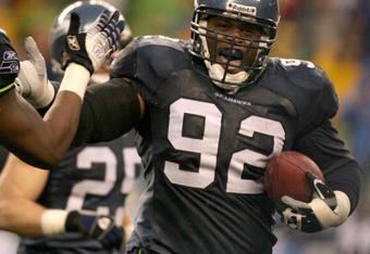 SEATTLE - DECEMBER 23:  Defensive tackle Brandon Mebane #92 of the Seattle Seahawks celebrates after recovering a fumble against the Baltimore Ravens at Qwest Field on December 23, 2007 in Seattle, Washington. The Seahawks defeated the Ravens 27-6.  (Photo by Otto Greule Jr/Getty Images)
