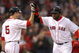 BOSTON - JUNE 11: David Ortiz #34 of the Boston Red Sox hits a home run and celebrates with teammate Rocco Baldelli against the New York Yankees at Fenway Park on June 11, 2009 in Boston, Massachusetts. (Photo by Jim Rogash/Getty Images)