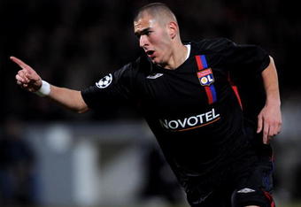 LYON, FRANCE - FEBRUARY 20:  Karim Benzema of Lyon celebrates after scoring during the UEFA Champions League first knockout round, first leg match between Lyon and Manchester United at the Stade Gerland on February 20, 2008 in Lyon, France.  (Photo by Shaun Botterill/Getty Images)