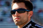 FORT WORTH, TX - APRIL 03:  Aric Almirola, driver of the #8 Guitar Hero Metallica Chevrolet, stands on the grid during qualifying for the NASCAR Sprint Cup Series Samsung 500 at Texas Motor Speedway on April 3, 2009 in Fort Worth, Texas.  (Photo by John Harrelson/Getty Images)