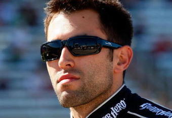 FORT WORTH, TX - APRIL 03:  Aric Almirola, driver of the #8 Guitar Hero Metallica Chevrolet, stands on the grid during qualifying for the NASCAR Sprint Cup Series Samsung 500 at Texas Motor Speedway on April 3, 2009 in Fort Worth, Texas.  (Photo by John Harrelson/Getty Images)