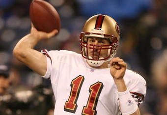 SEATTLE - NOVEMBER 12:  Alex Smith #11 of the San Francisco 49ers fades back to pass during the NFL game against the Seattle Seahawks at Qwest Field on November 12, 2007 in Seattle, Washington. (Photo by Otto Greule Jr/Getty Images)