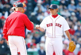 BOSTON - APRIL 9: Manager Terry Francona removes Daisuke Matsuzaka #18 of the Boston Red Sox against the Tampa Bay Rays at Fenway Park, April 9, 2009, in Boston, Massachusetts. (Photo by Jim Rogash/Getty Images)