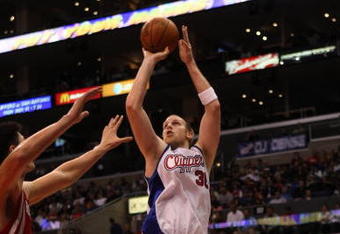 LOS ANGELES, CA - NOVEMBER 07:  Chris Kaman #35 of the Los Angeles Clippers shoots against the Houston Rockets on November 7, 2008 at Staples Center in Los Angeles, California.  The Rockets won 92-83.  NOTE TO USER: User expressly acknowledges and agrees that, by downloading and/or using this Photograph, user is consenting to the terms and conditions of the Getty Images License Agreement.  (Photo by Stephen Dunn/Getty Images)
