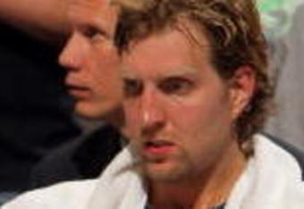 DENVER - MAY 13:  Dirk Nowitzki #41 of the Dallas Mavericks sits on the bench late in the game against  the Denver Nuggets in Game Five of the Western Conference Semifinals during the 2009 NBA Playoffs at Pepsi Center on May 13, 2009 in Denver, Colorado. The Nuggets defeated the Mavericks 124-110 to advance to the Western Conference Finals. NOTE TO USER: User expressly acknowledges and agrees that, by downloading and or using this photograph, User is consenting to the terms and conditions of the Getty Images License Agreement.  (Photo by Doug Pensinger/Getty Images)