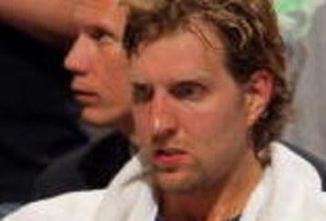 DENVER - MAY 13:  Dirk Nowitzki #41 of the Dallas Mavericks sits on the bench late in the game against  the Denver Nuggets in Game Five of the Western Conference Semifinals during the 2009 NBA Playoffs at Pepsi Center on May 13, 2009 in Denver, Colorado. The Nuggets defeated the Mavericks 124-110 to advance to the Western Conference Finals. NOTE TO USER: User expressly acknowledges and agrees that, by downloading and or using this photograph, User is consenting to the terms and conditions of the Getty Images License Agreement.  (Photo by Doug Pensinger/Getty Images)