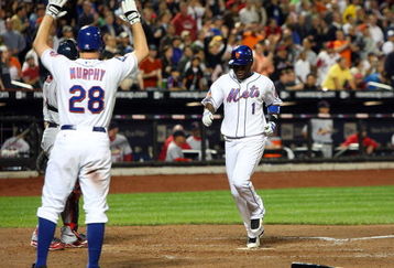 NEW YORK - JUNE 22:  Luis Castillo #1 of the New York Mets scores a run in the sixth inning against the St. Louis Cardinals on June 22, 2009 at Citi Field in the Flushing neighborhood of the Queens borough of New York City.  (Photo by Jim McIsaac/Getty Images)