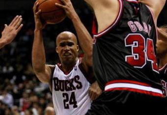 MILWAUKEE - FEBRUARY 18: Richard Jefferson #24 of the Milwaukee Bucks drives against Aaron Gray #34 of the Chicago Bulls on February 18, 2009 at the Bradley Center in Milwaukee, Wisconsin. The Bulls defeated the Bucks 113-104. NOTE TO USER: User expressly acknowledges and agreees that, by downloading and/or using this Photograph, User is consenting to the terms and conditions of the Getty Images License Agreement. (Photo by Jonathan Daniel/Getty Images)