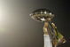 Tom Brady holds the Vince Lombardi Trophy as he stands on the podium after The New England Patriots defeated The Philadelphia Eagles in Super Bowl XXXIX at Alltel Staduim in Jacksonville, Florida.  (Photo by Al Messerschmidt/Getty Images)