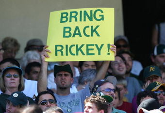 OAKLAND, CA - AUGUST 11:  A fan of the Oakland Athletics holds up a sign in support of Rickey Henderson during a game against the Los Angeles Angels of Anaheim at McAfee Coliseum on August 11, 2005 in Oakland, California. The A's defeated the Angels 5-4.  (Photo by Jed Jacobsohn/Getty Images)